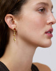 Wouters & Hendrix - Asymmetric Stud earrings With Heart-Shaped Garnet and Dangling Arrow