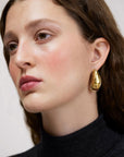 Wouters & Hendrix - Stud Earrings with Double-Sided Mussel in Gold
