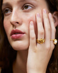 Wouters & Hendrix - Statement Ring with Textured Chain Links and Rose in Gold