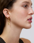 Wouters & Hendrix - Asymmetric Stud earrings With Heart-Shaped Garnet and Dangling Arrow