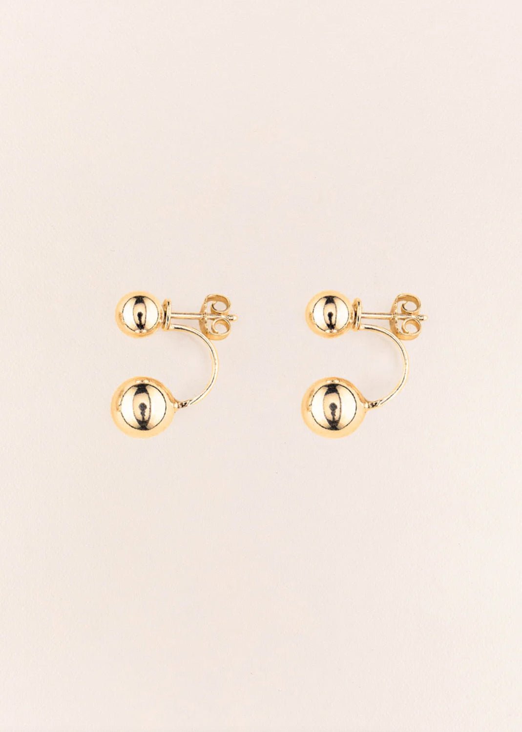 Wouters & Hendrix - Stud Earrings with Floating Spheres in GOLD