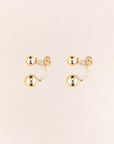 Wouters & Hendrix - Stud Earrings with Floating Spheres in GOLD