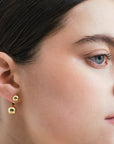 Wouters & Hendrix - Stud Earrings with Floating Spheres in GOLD