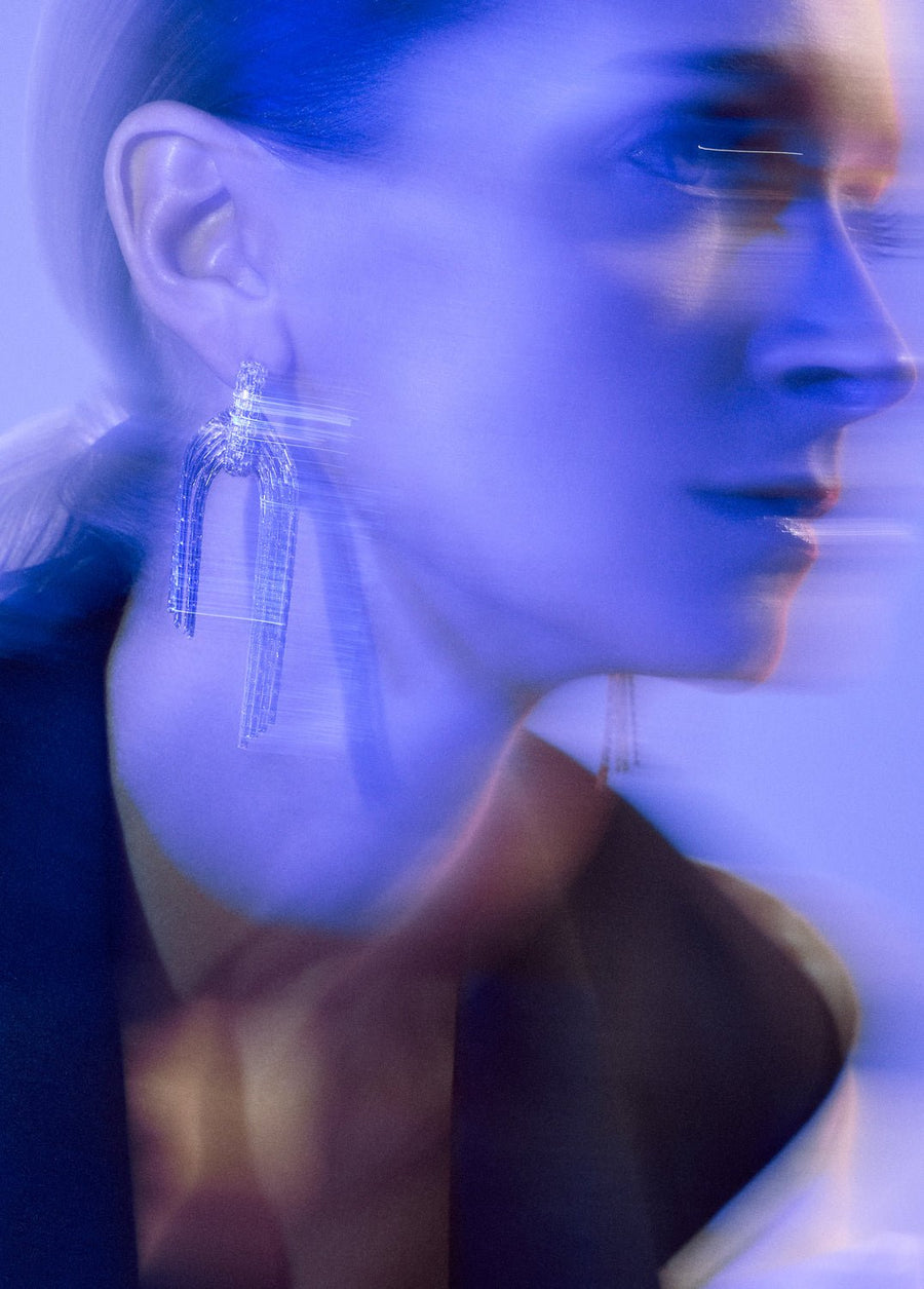 Wouters & Hendrix - Statement hoop earrings with detachable flowing chains in gold