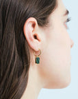 Wouters & Hendrix - Single Gold Hoop Earring with Malachite and Onyx Pendant