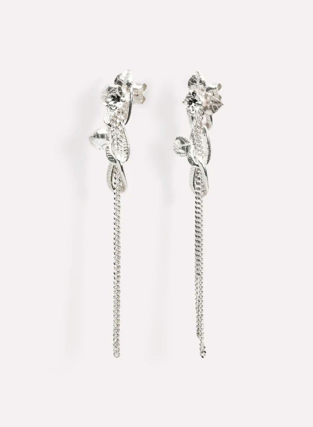 Wouters & Hendrix - Statement Stud Earrings with Crystal Flower and Entangled Flowing Chains in Silver