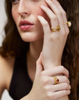 Wouters & Hendrix - Thorned Ring Set with Heart-Shaped Garnet in Gold