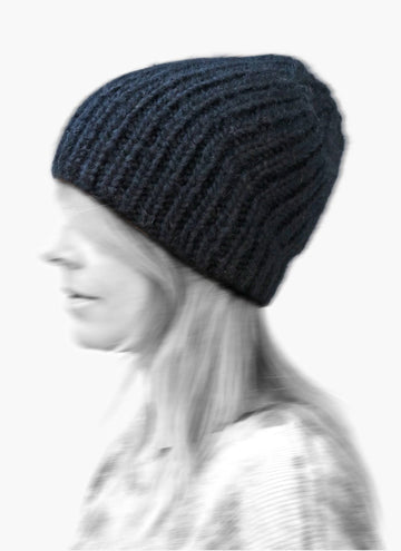 KARAKORAM - Knitted Slant Beanie in Navy
